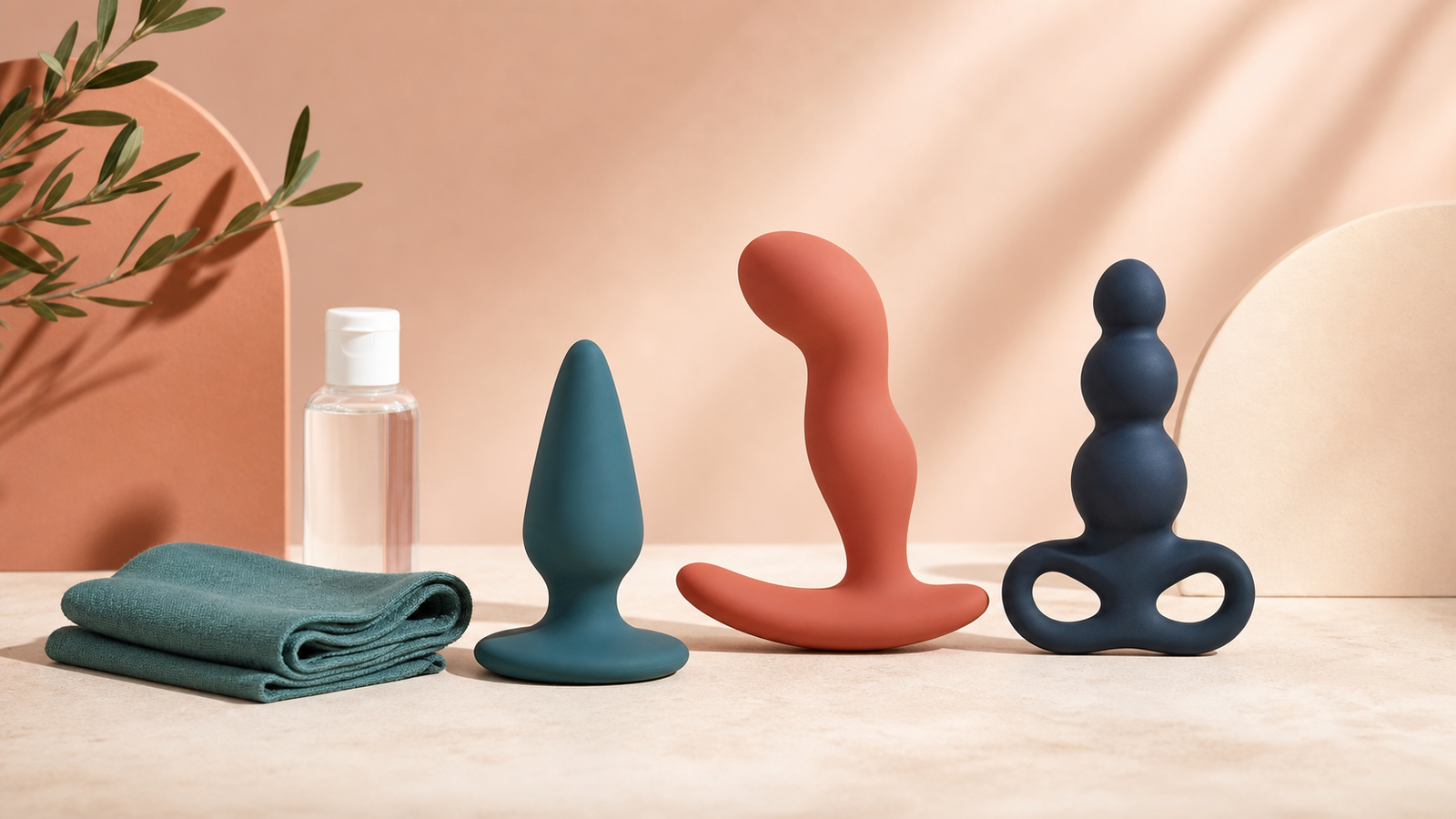 Beginner anal toy formats with wide safety bases, lubricant, and cleaning cloth