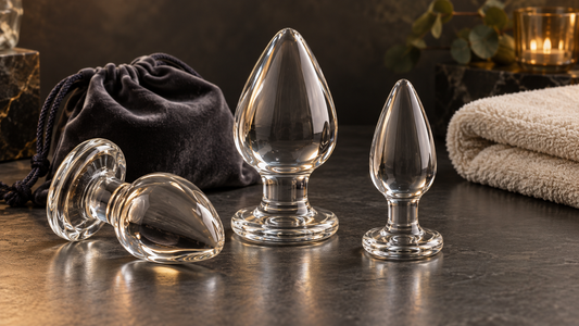 Illustrative clear glass plug shapes with broad bases and padded storage