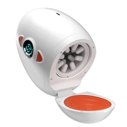 White rotating glans stroker open with orange base massage pad